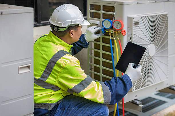 Professional Heat Pump Repair technician working in Wheatfield, IN
